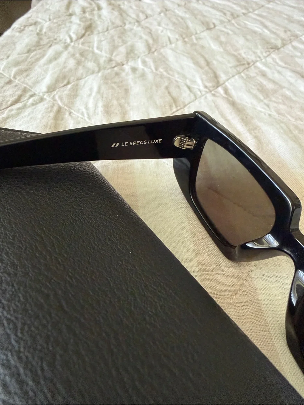 Le Specs sleek black